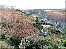 WV5955 : Ramblers on the Jersey Coast Path by Oliver Dixon